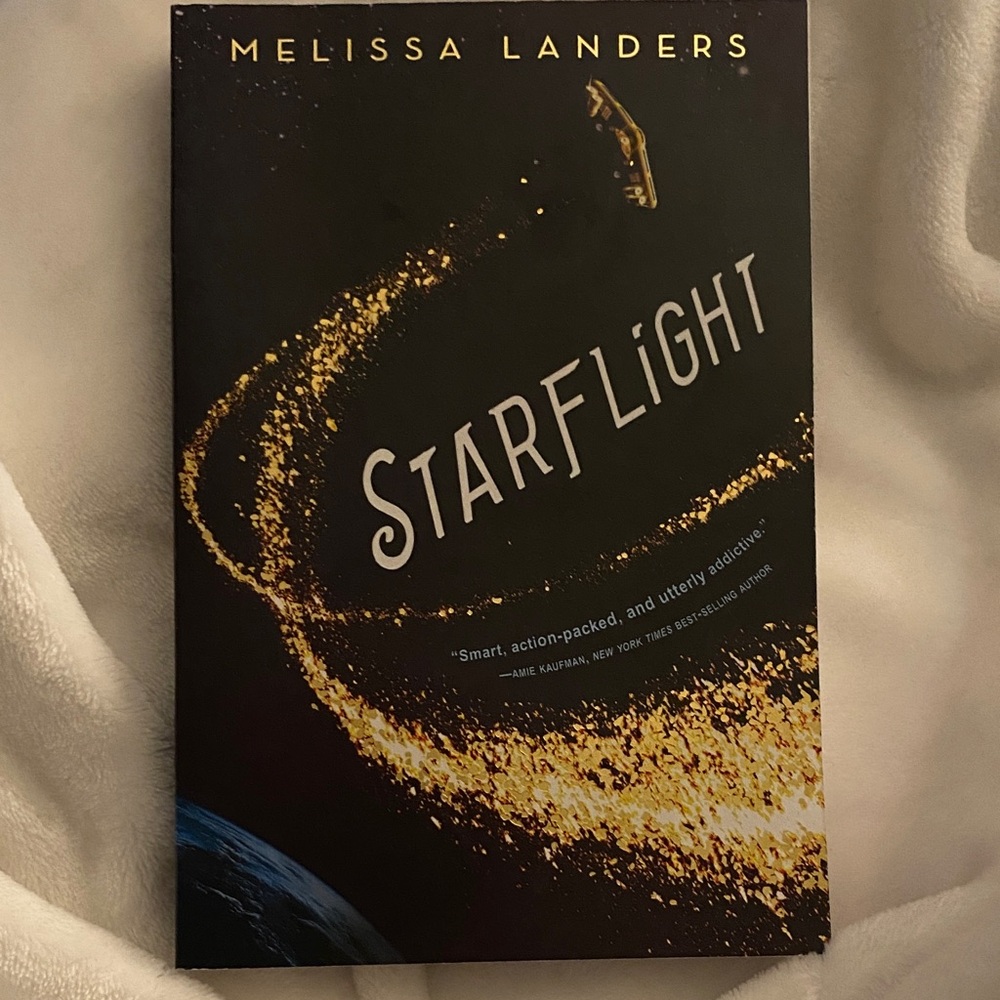 "Starflight" by Melissa Landers - paperback